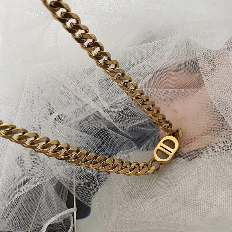 Cocoguchi golden color Thick Letter  Titanium Steel Necklace & Bracelet for Women four sealsonal wearage popular fashion jewelry